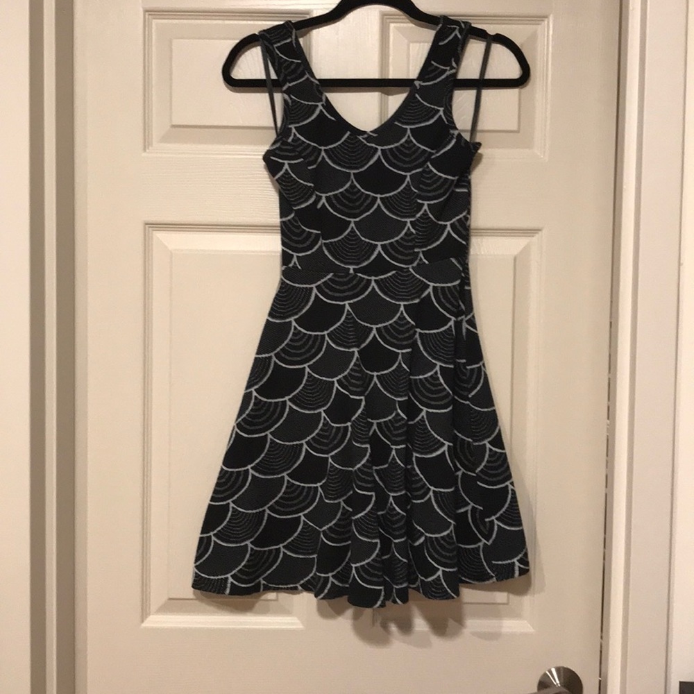 Black scalloped dresses